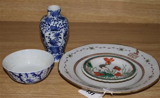 A Chinese export plate with English crest, a dish, a small bowl and a vase